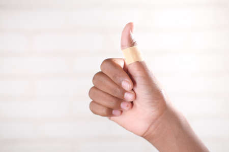 person hands with gauze bandage wrapped around .の写真素材