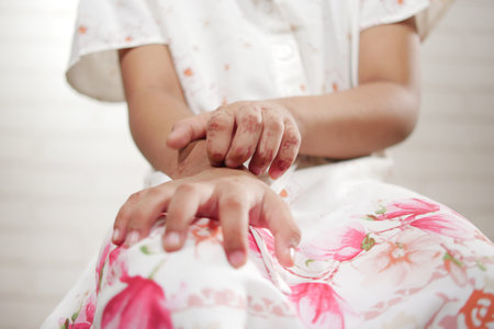 child girl suffering from itching skin, close up.