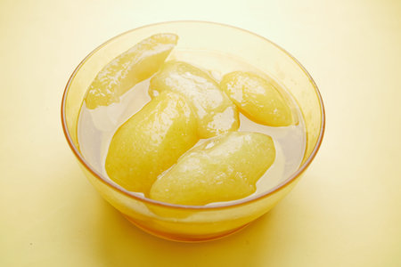 Homemade Mango Pickle in a glass jar on table ,