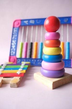 Baby toys on color background. Child development concept.