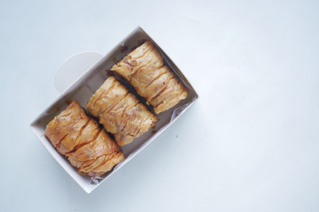 arabic dessert baklava on a white backgroundの写真素材