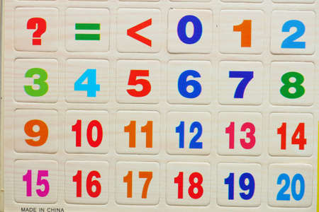 colorful plastic letters on white background, close upの写真素材