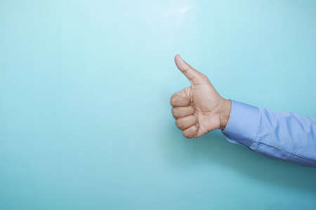 man hand showing a thumb-upの写真素材