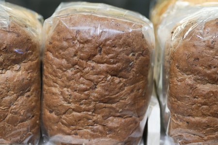 close up of brown bread in a plastic packet