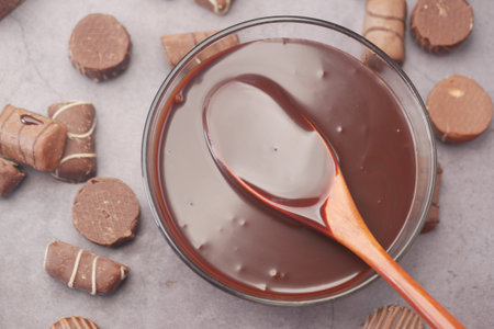 dark chocolate cream in a bowl on whiteの写真素材