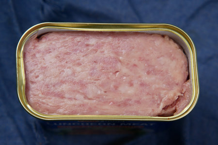 close up of canned meat on table