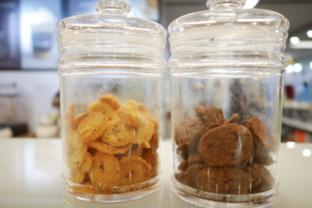close up of sweet cookies in a glass jar