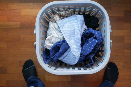 top view of Clothes in basket on floor