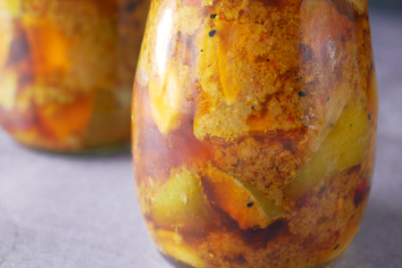 Homemade Mango Pickle in a glass jar on table ,の写真素材