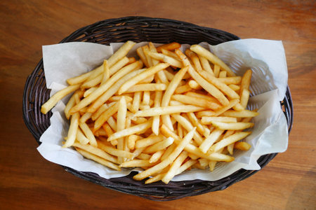 top view of french fries in a bowl on table