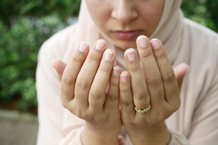 Close up of muslim women hand praying at ramadan