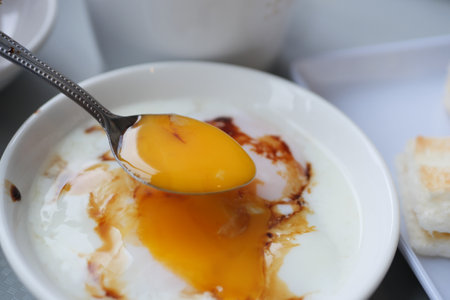 Fried eggs in the plate close up ,の写真素材