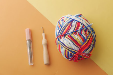 top view of multi color yarn on color backgroundの写真素材