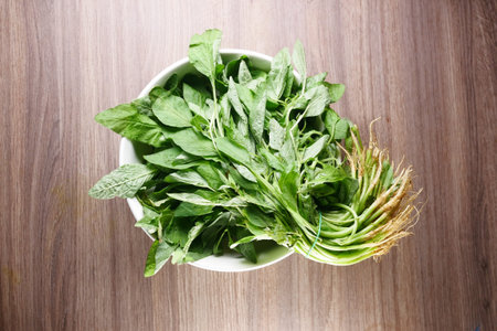 Fresh spinach leaves on table ,