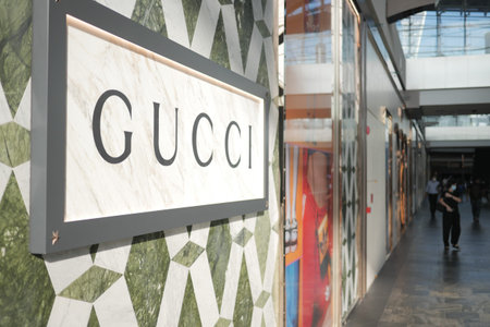 Singapore Marina bar 12 June 2022. Gucci sign on a marble wall.のeditorial素材