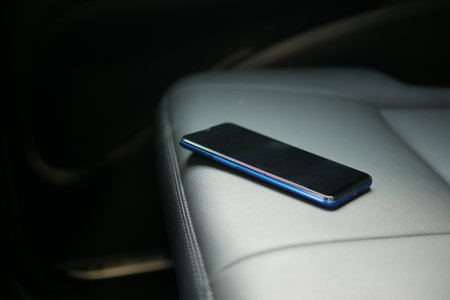 forget smartphone on car sit, lost smart phoneの写真素材