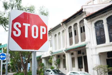Stop sign in a empty roadの写真素材