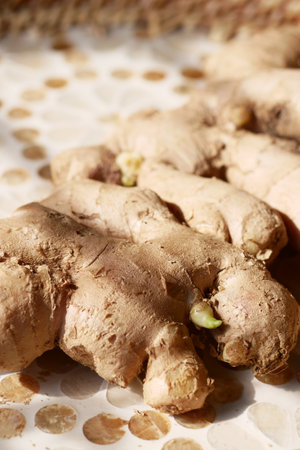Close up of Gingers on chopping board.の写真素材