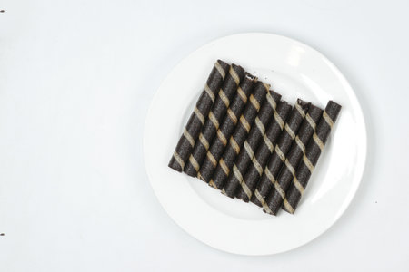 top view of wafer roll chocolate on white backgroundの写真素材