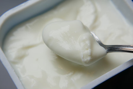 fresh yogurt in a bowl on tableの写真素材