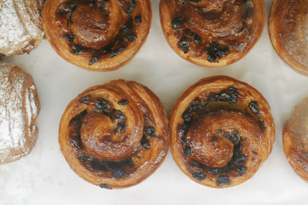 close up cinnamon danish roll on table