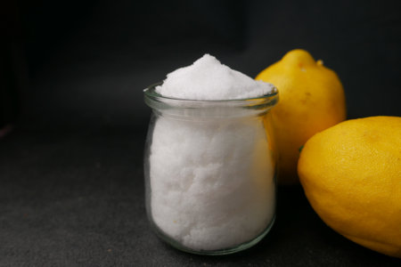 salt and lemon on black backgroundの写真素材