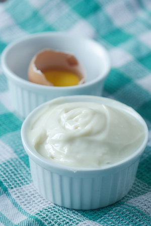 fresh cream and egg in a containerの写真素材