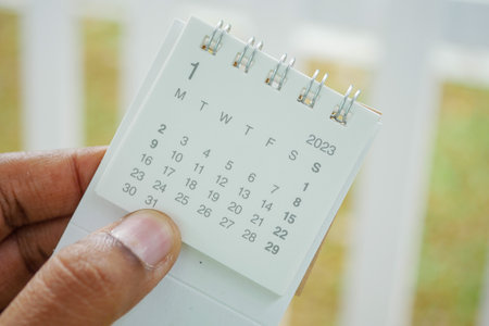 holding 2023 year calendar close upの写真素材