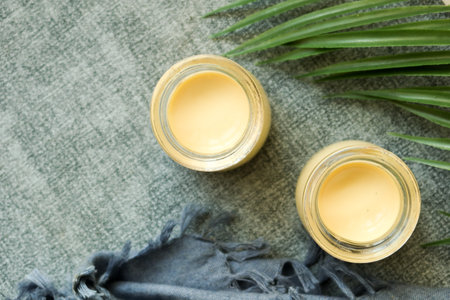 overhead view of Caramel pudding in a glass jar on tableの写真素材