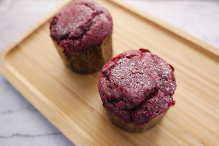 Close up of Muffins on Table Isolated on black,