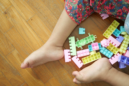 colorful building blocks on wooden table, close up
