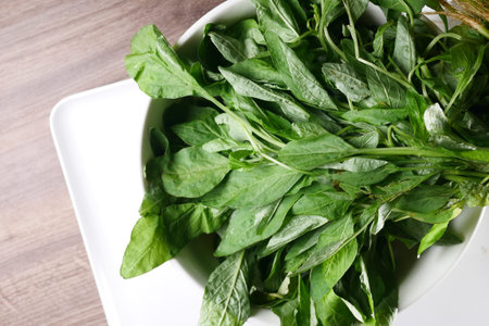 Fresh spinach leaves on table ,の写真素材