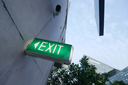 exit sign on brick wall