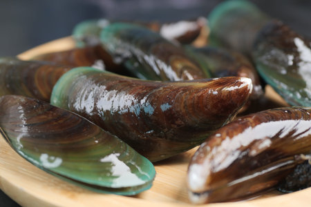 Thai mussels in metal on table top view