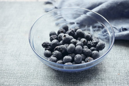 Close up of fresh blue berry with water drops .の写真素材