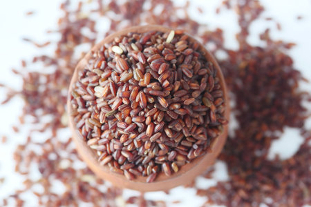 red rice in a bowl on table , haradighi riceの写真素材