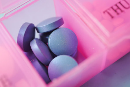 close up of blue color medical pills in a pill boxの写真素材