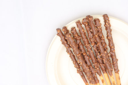 almond nut dark chocolate stick on tableの写真素材