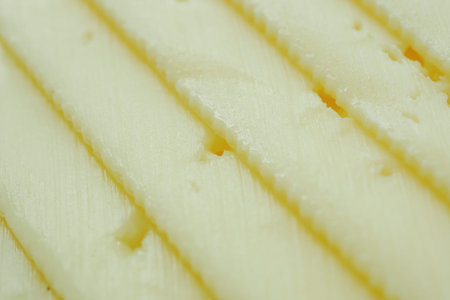 close up of fresh cheese on white background.