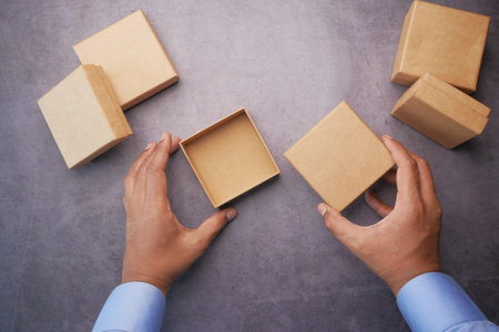 top view of person open a empty small gift boxの写真素材