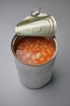 preserved canned tomato beans on tableの写真素材