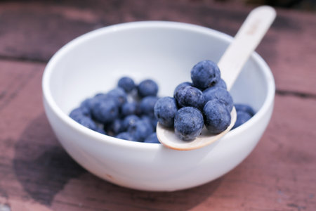 Close up of fresh blue berry with water drops .の写真素材