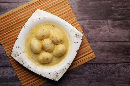 top view of Egg Curry in a bowl on table