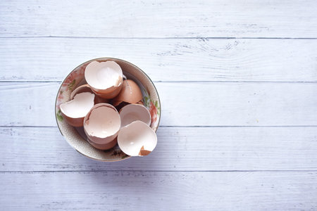 eggshells in a white color bowl on table