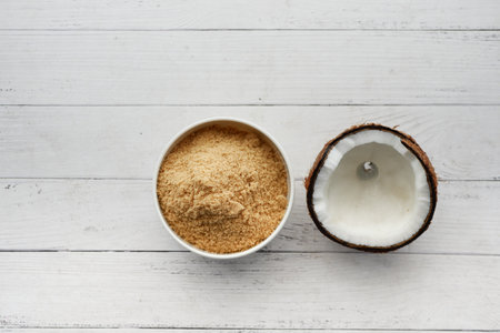 coconut sugar in a white bowl on tableの写真素材