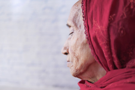 side view of sad elderly woman looking away .の写真素材