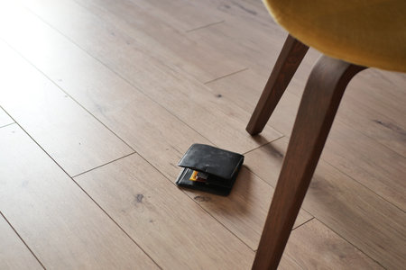 left wallet on floor at homeの写真素材