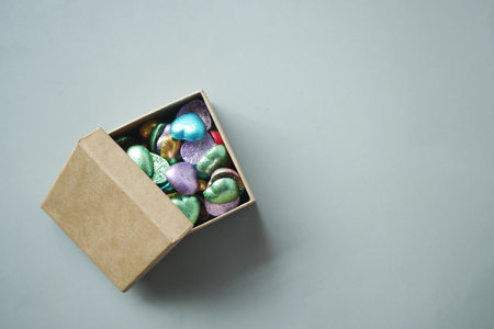 top view of chocolate in a box on gray backgroundの写真素材