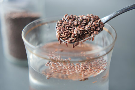 close up of chia seeds in a glass of waterの写真素材