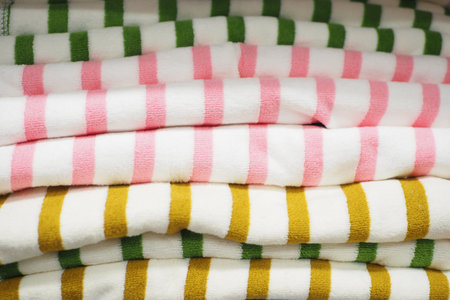 Close up of stack of shower towel on table.の写真素材